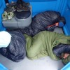 Team Traces of Nuts sleeping in a port-a-loo at Expedition Alaska